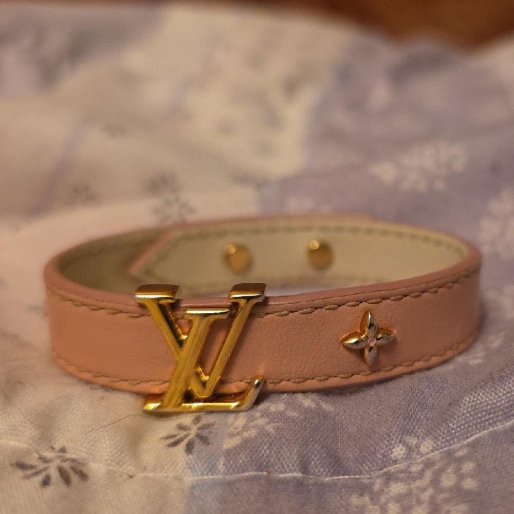 Louis Vuitton Pink and Gold Watch with Monogram Design